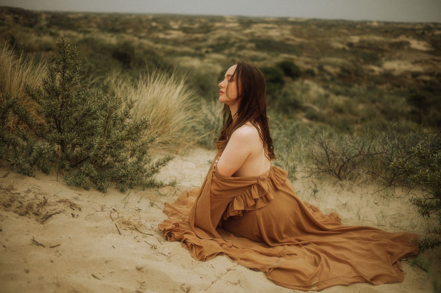 Series of desert landscape photos with sand dunes and dried grass.