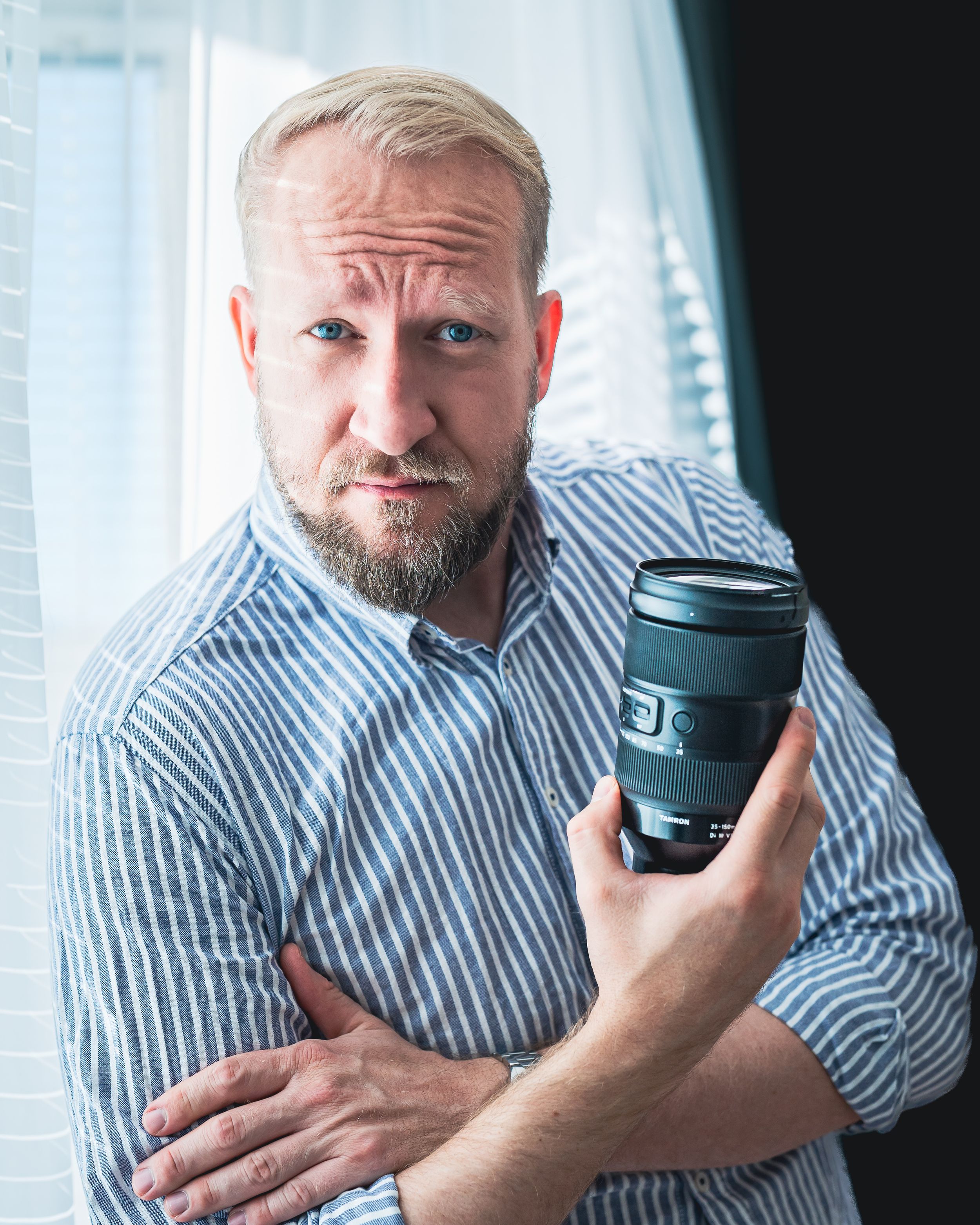 Portrait of Bartek Olber, a professional photographer, in a confident pose. Great for personal branding, business profiles, and media use.