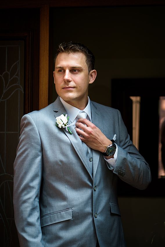 Groom portrait in doorway - Kelly Chapman Photographer Perth