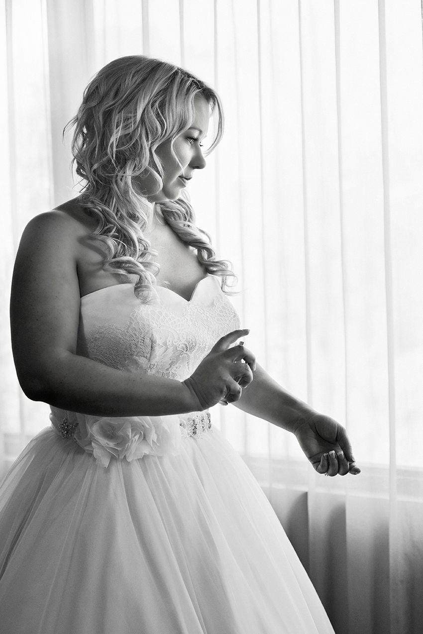 bride spraying perfume - Kelly Chapman Photographer Perth