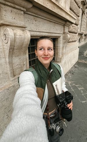 A series of photos against a stone building wall with architectural details in Rome.