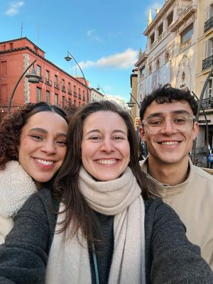 A selfie of a photographer with a freshly married couple in Madrid.