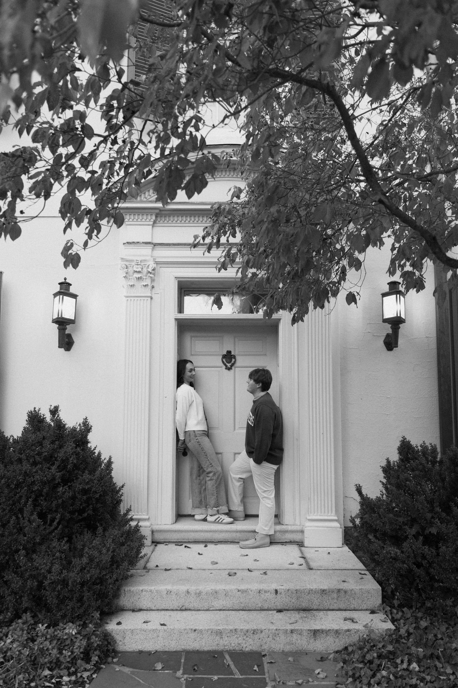 A black and white photo sequence shows two people walking up steps to a columned entrance of a building.