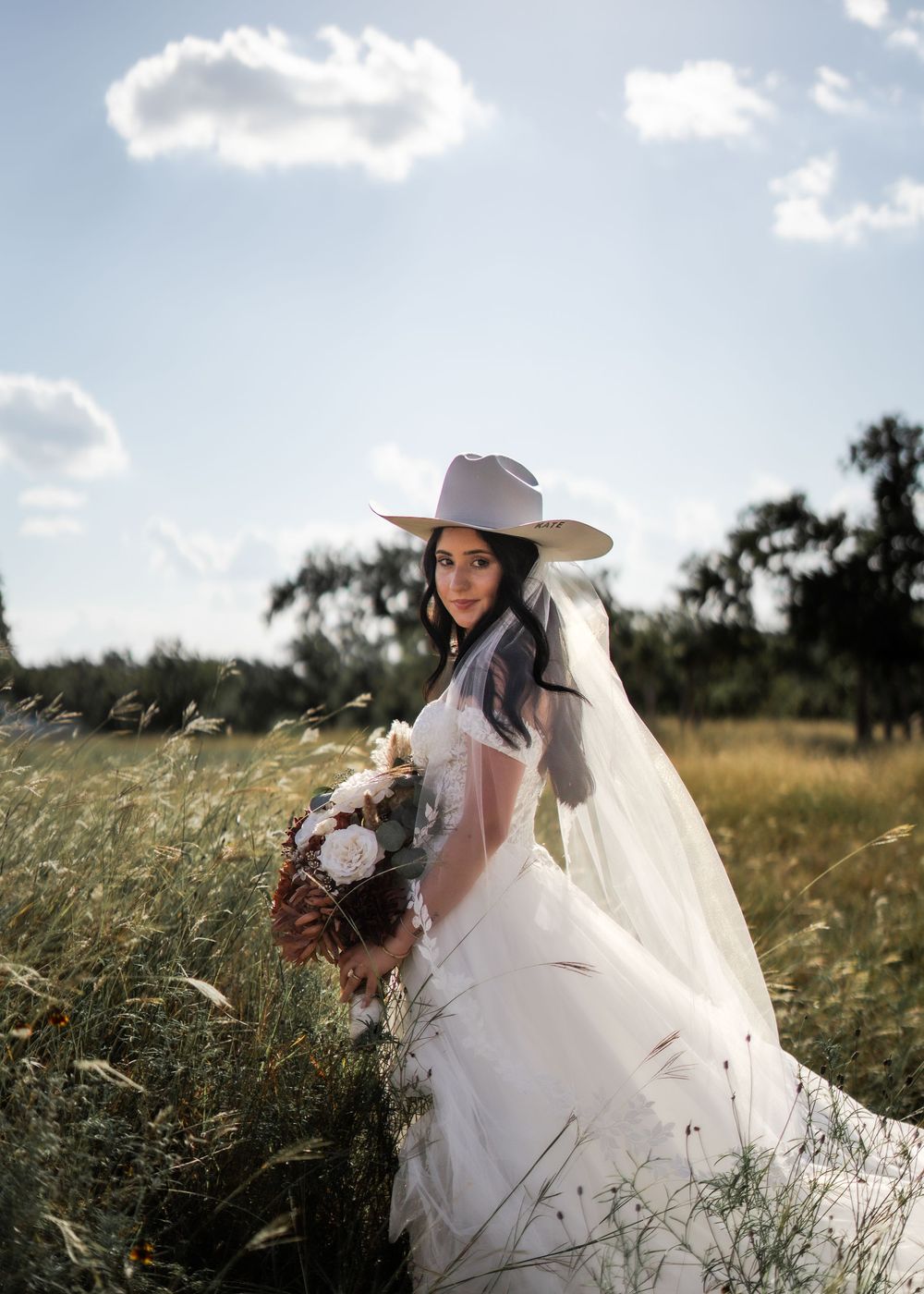 Bridal session in Fredickburg, TX. Western style photography. Natural light, wedding photography, candid moments, bridal photography.