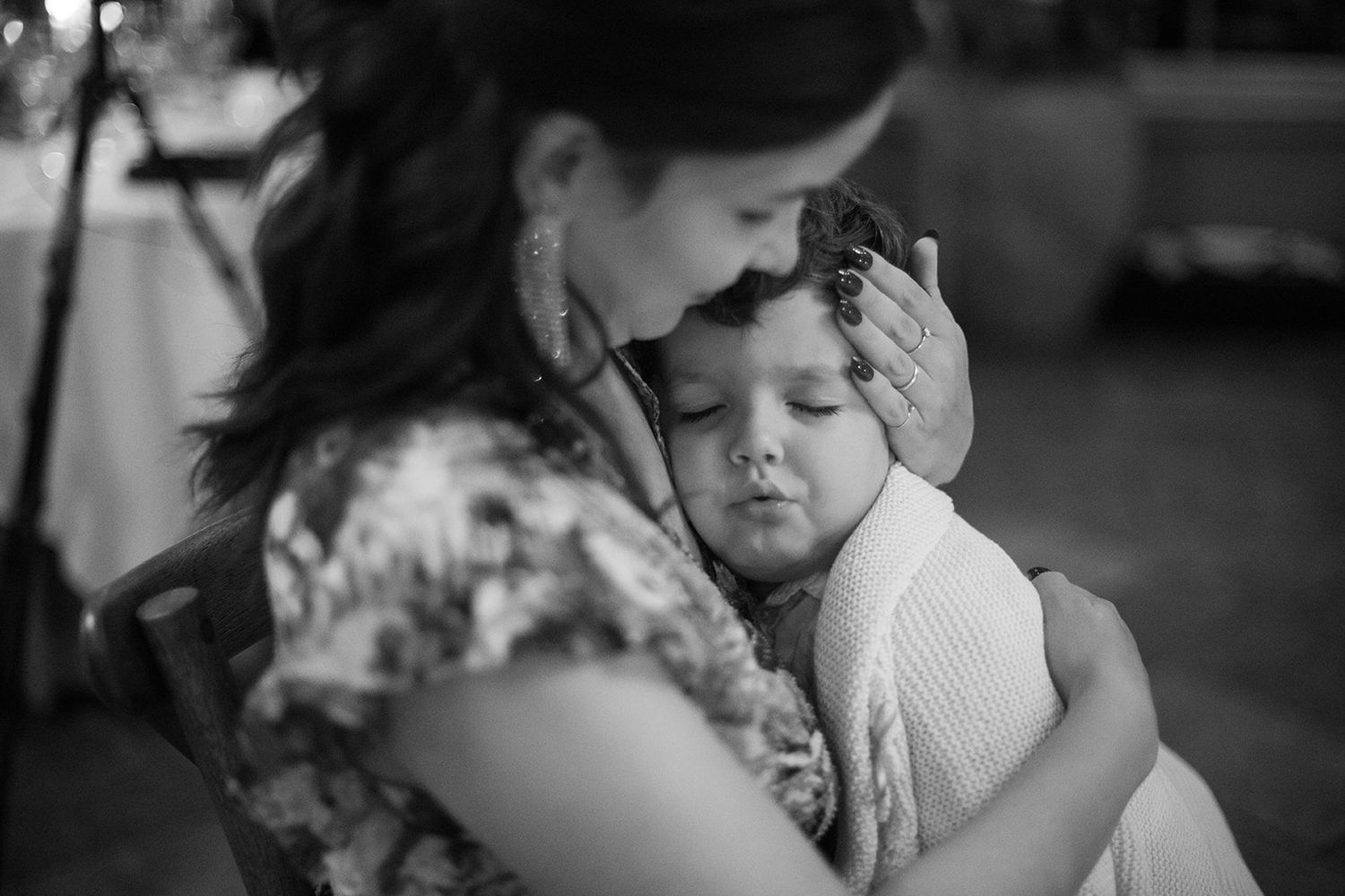 Black and white collage of candid moments showing people embracing and sharing intimate emotional connections.