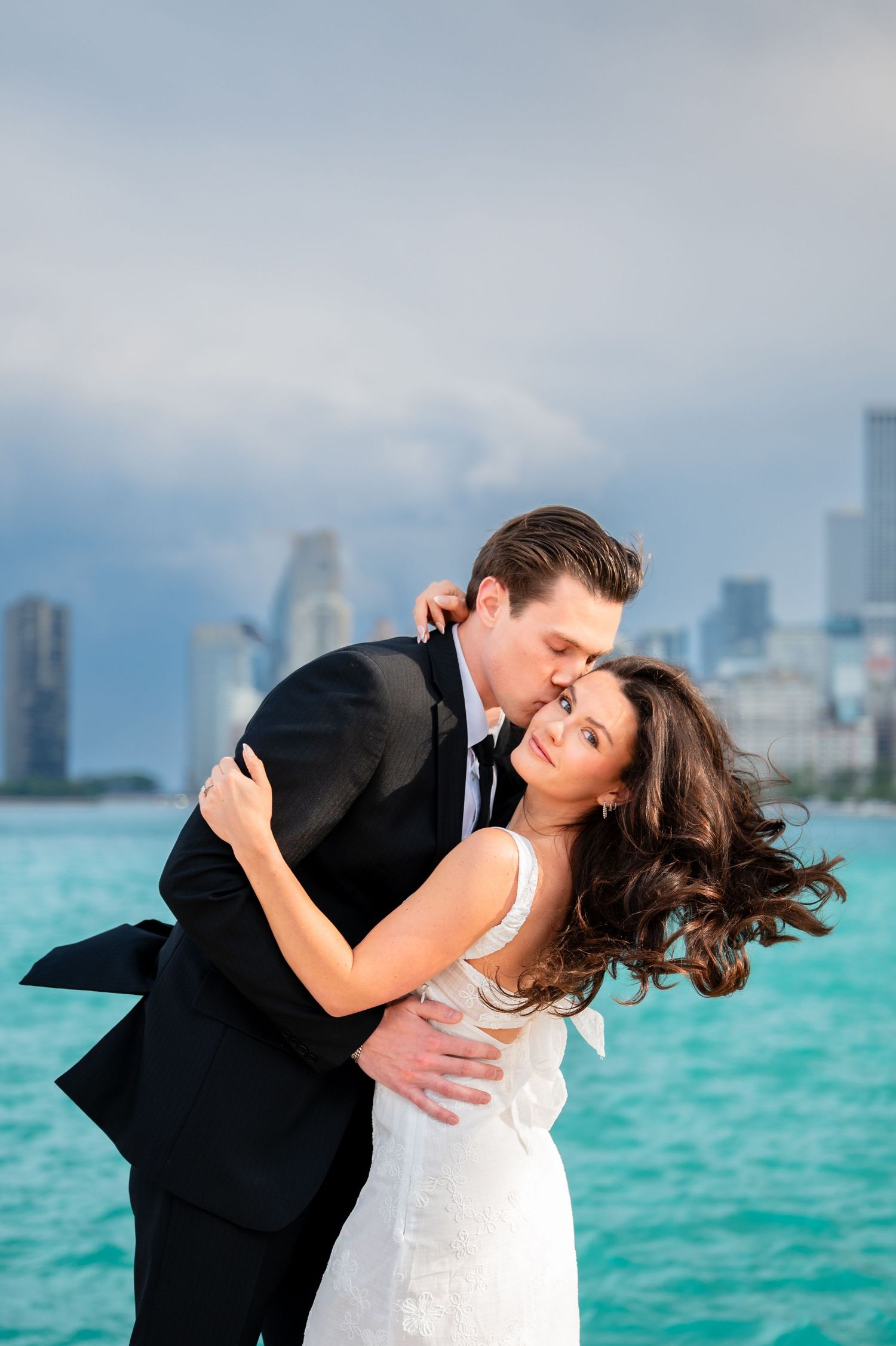 A romantic wedding couple shares intimate moments against a green background in a series of progressive shots.
