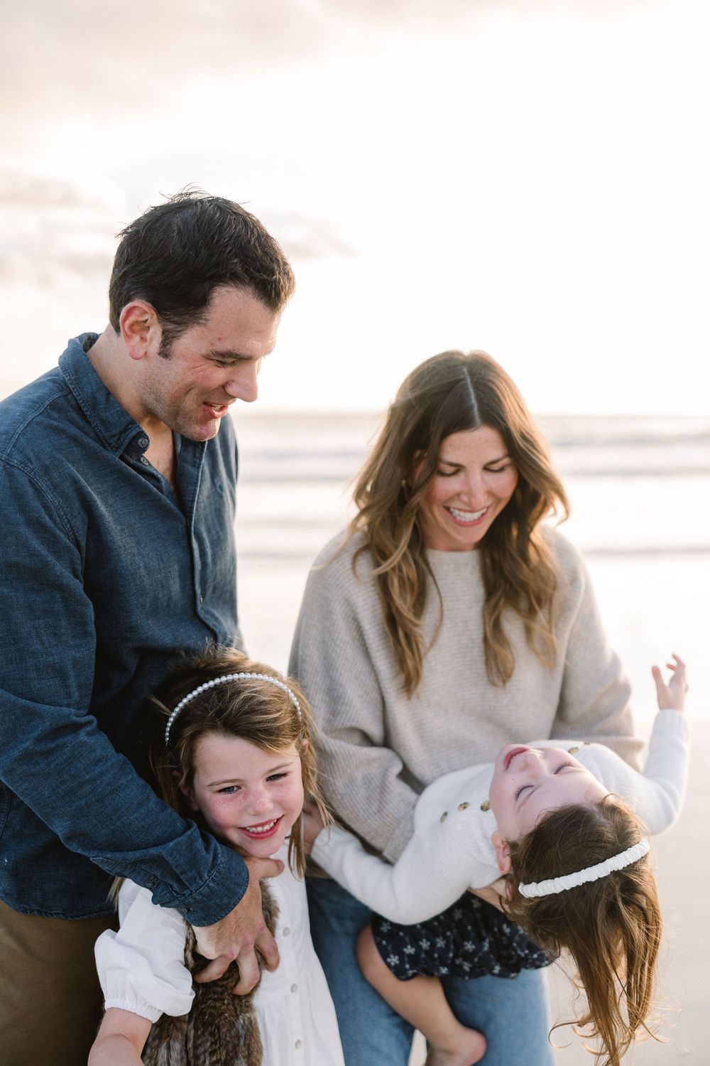 A playful family moment captured in a series of candid photos showing joyful interaction on a bright day.