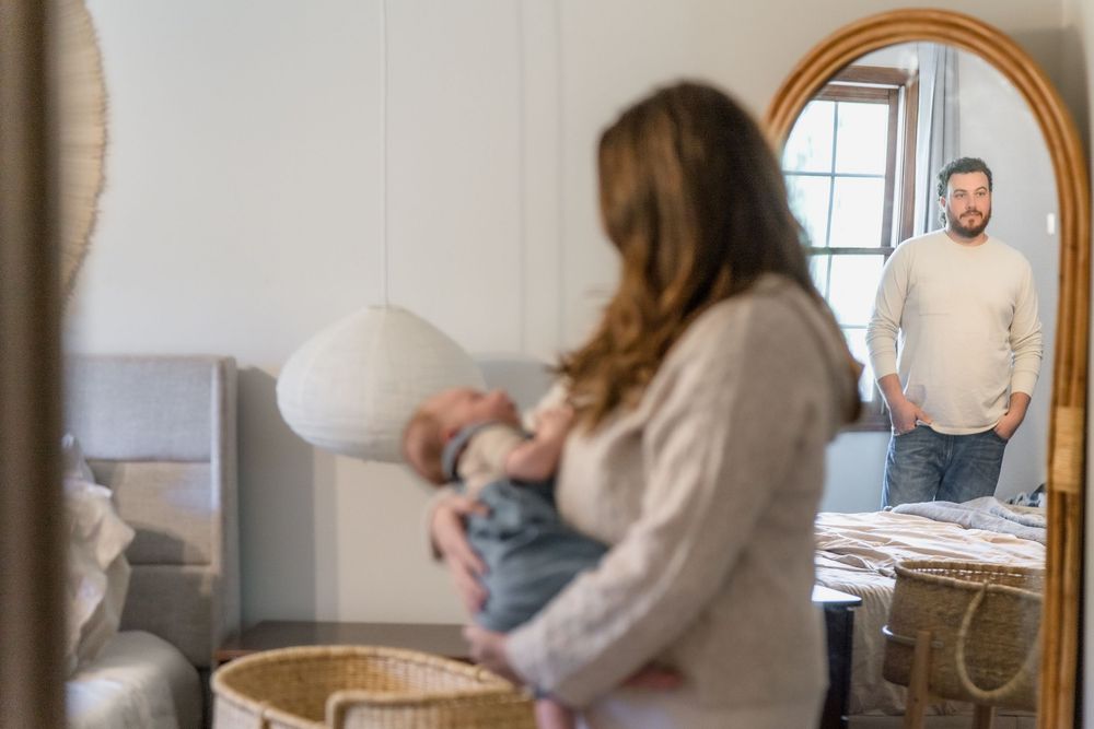A series of candid shots showing a nursery room with antique furniture and natural lighting in Macedonia, Ohio in-home newborn photo session