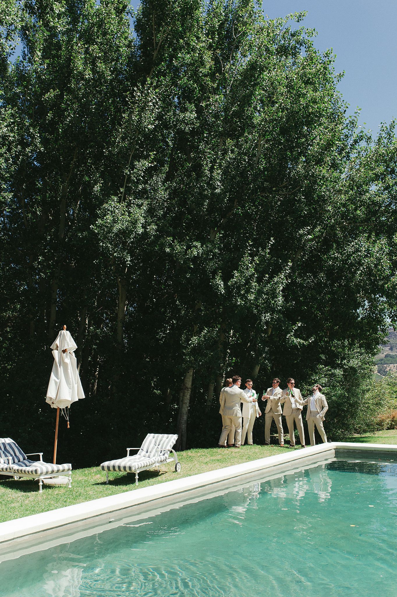 Groom and groomsmen getting ready at La Cotte cottage in Franschhoek