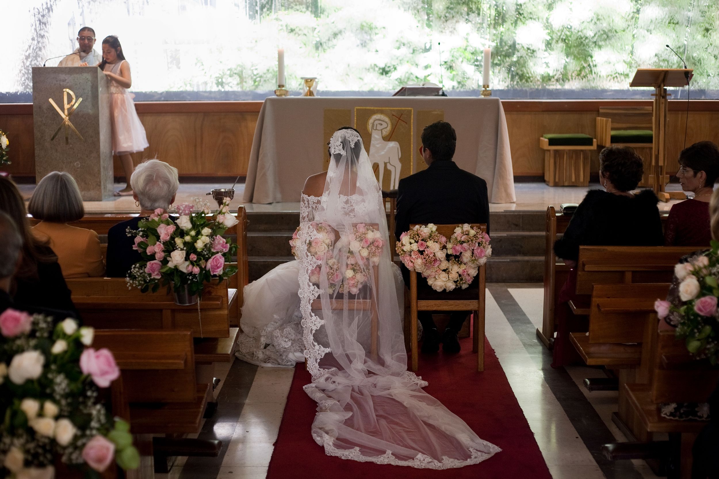A couple gets married in a Catholic church.