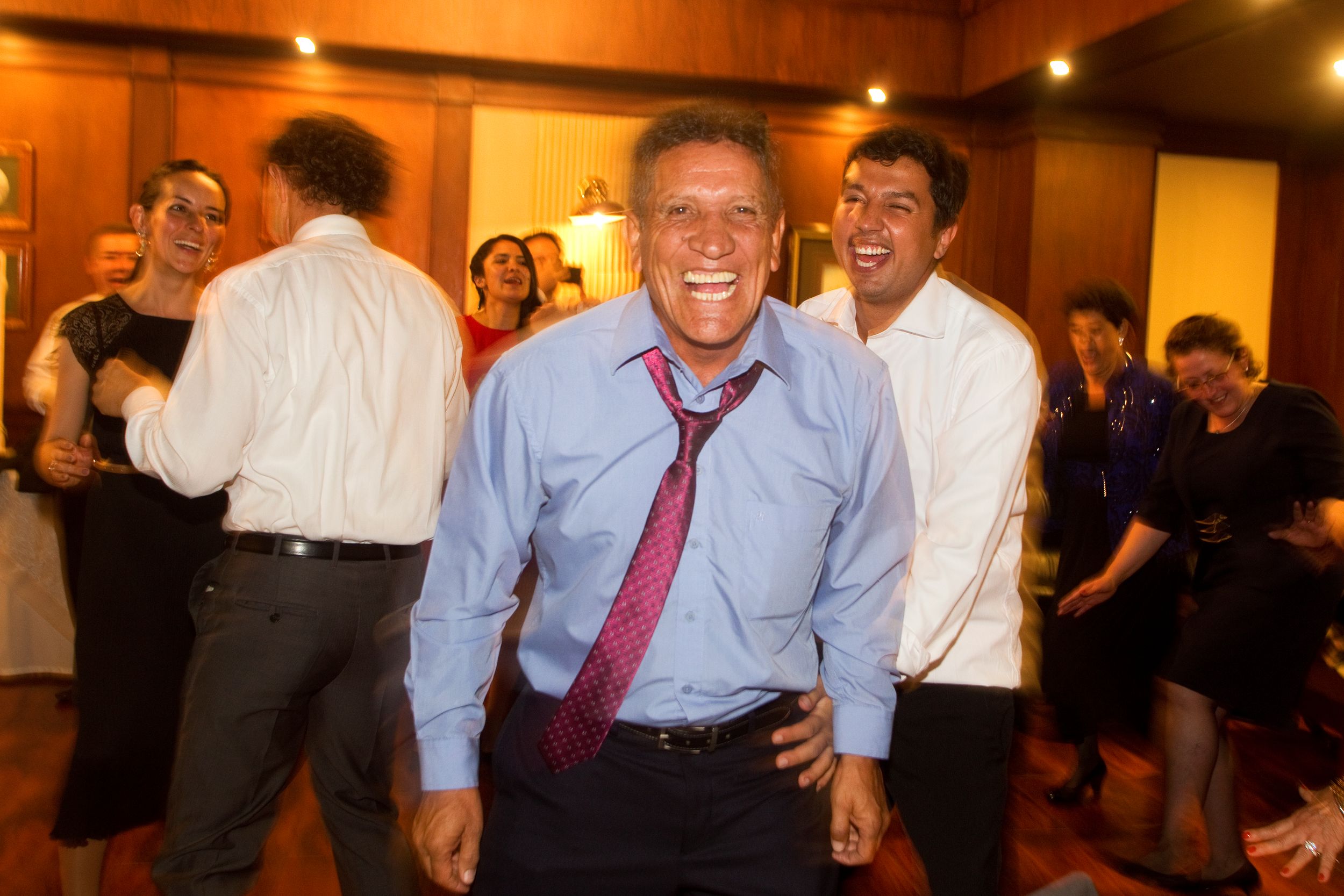 Family and friends having fun during the wedding party.