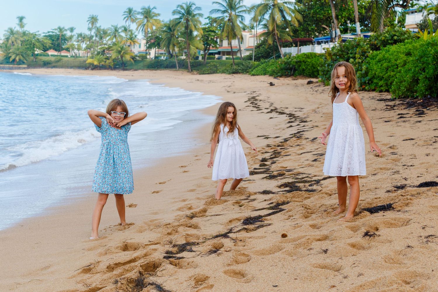 Three girls on the beach in Dorado, Puerto Rico.