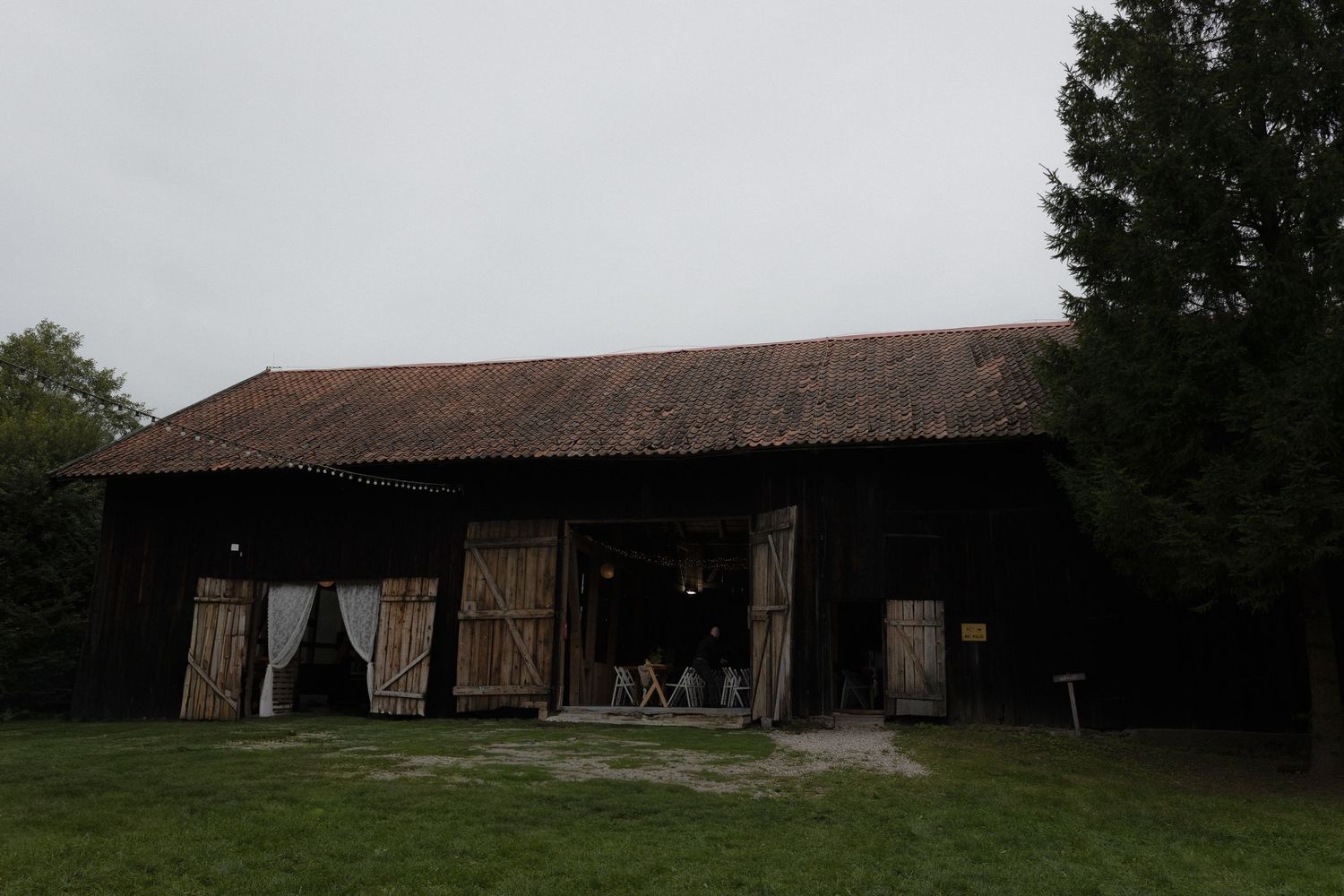 A wooden farm storage barn with a weathered exterior visible from multiple angles in a five-image collage.