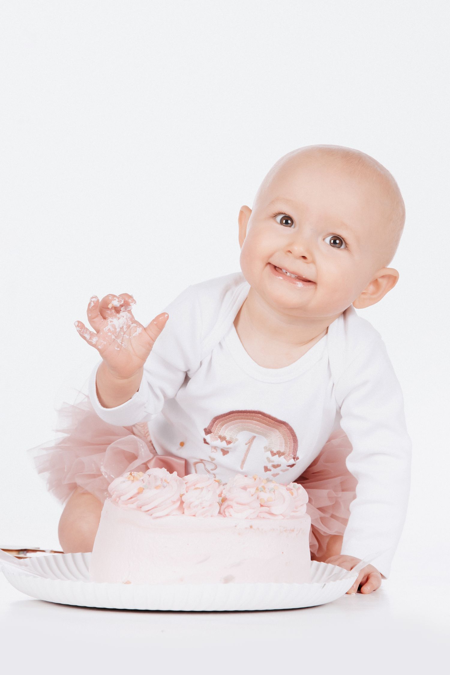 Studiofotografie von einem kleinen Kind zu ersten Geburtstag. Es ist ein Cake smash shooting in Gelsenkirchen Hassel .