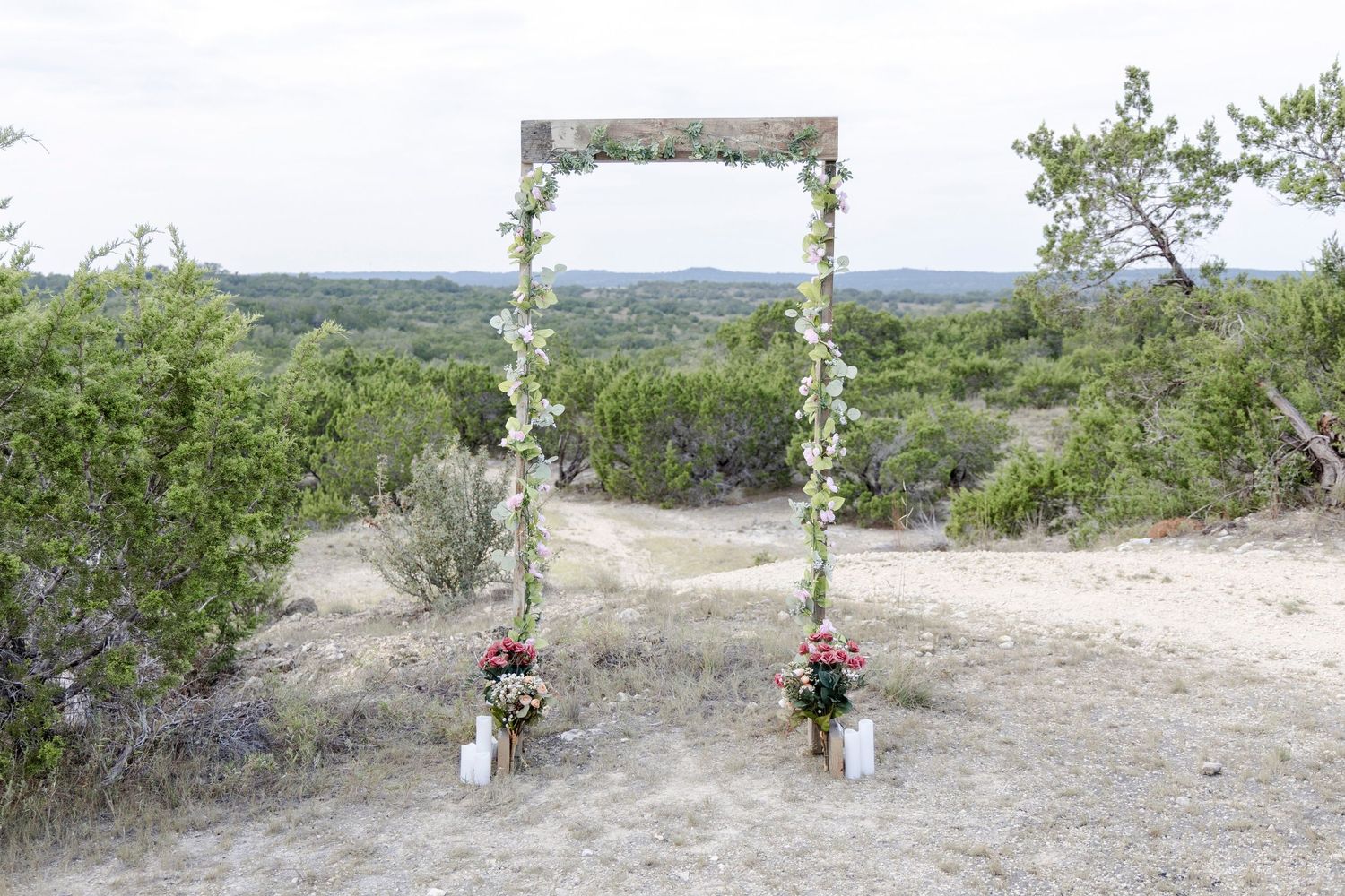 Detail shot of rustic arch decorations for Dripping Springs engagement proposal.
