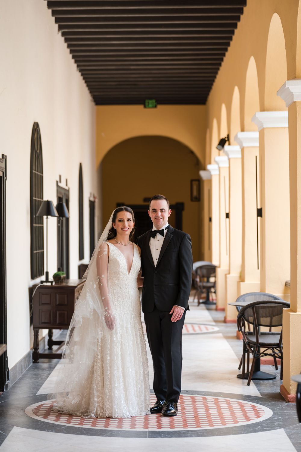 Bride and groom portrait together at Hotel El Convento in Old San Juan Puerto Rico