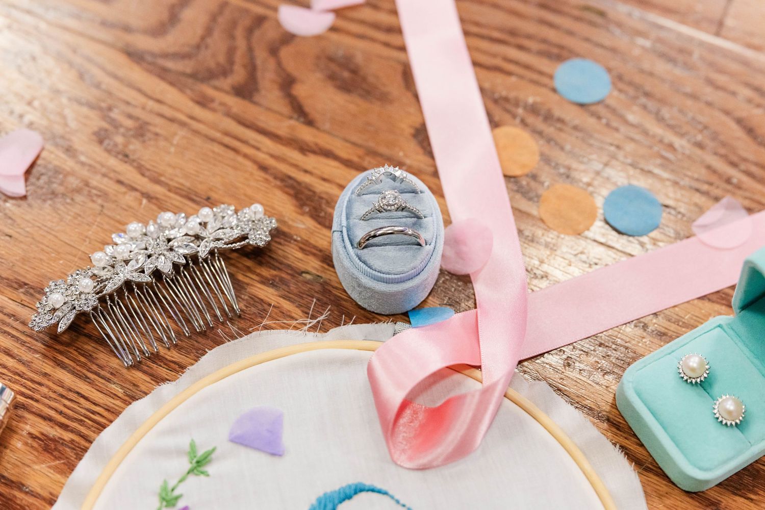 stunning wedding ring detail shot with colorful decor
