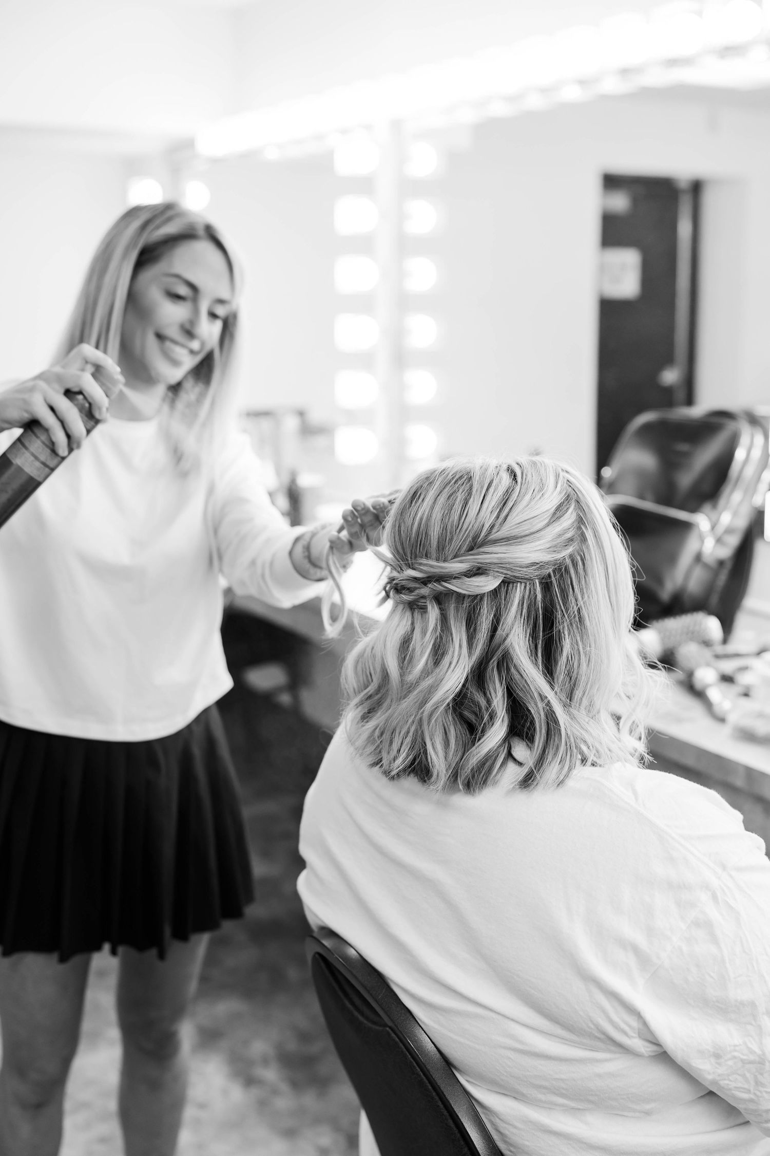 bride getting finishing touches on her hair at the Hoogland center in downtown springfield il