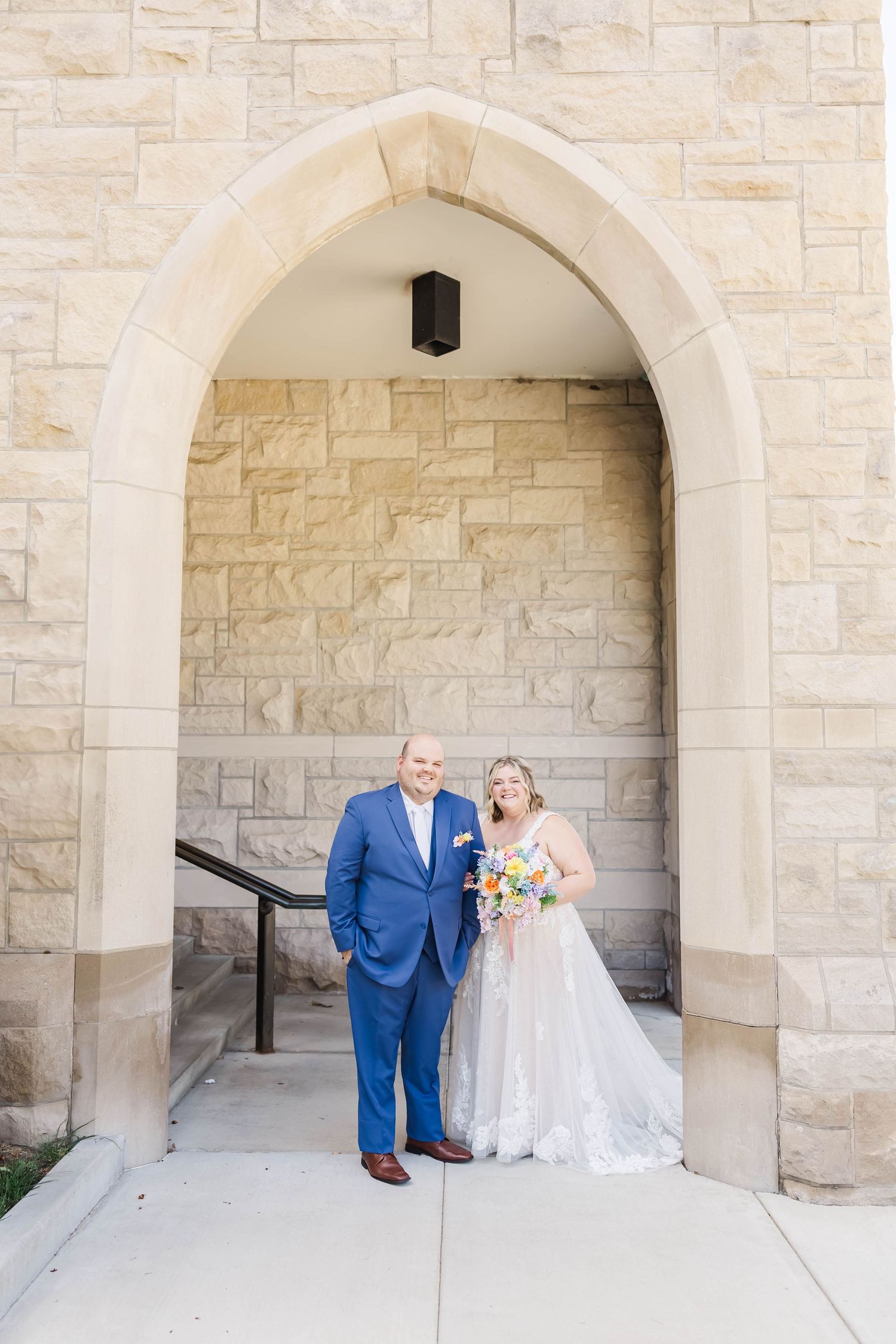 smiling bride and groom at downtown springfield church