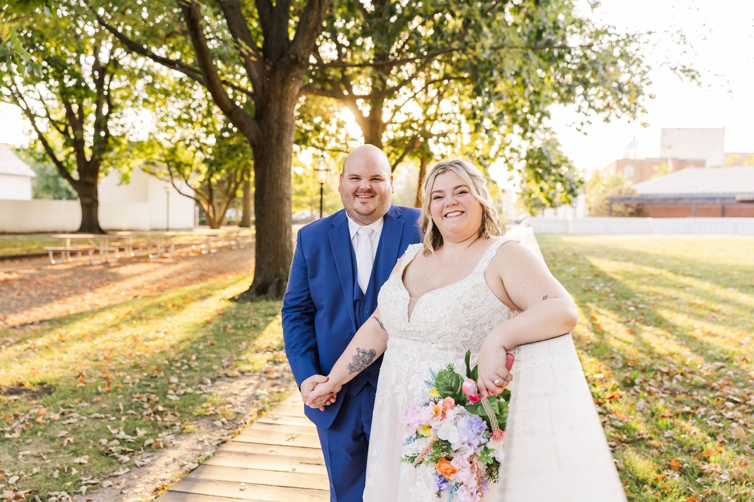 Bride and groom embracing in warm sunset light at Lincoln Home National Historic Site