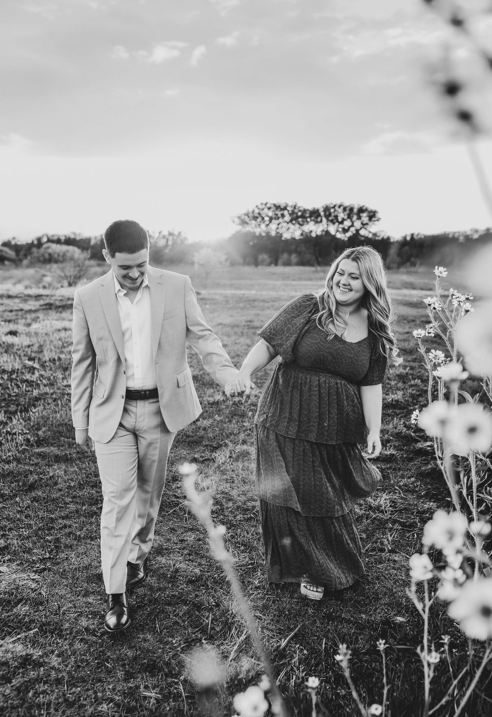 Engagement photos with sunset sky at Grapevine Lake Flower Mound.
