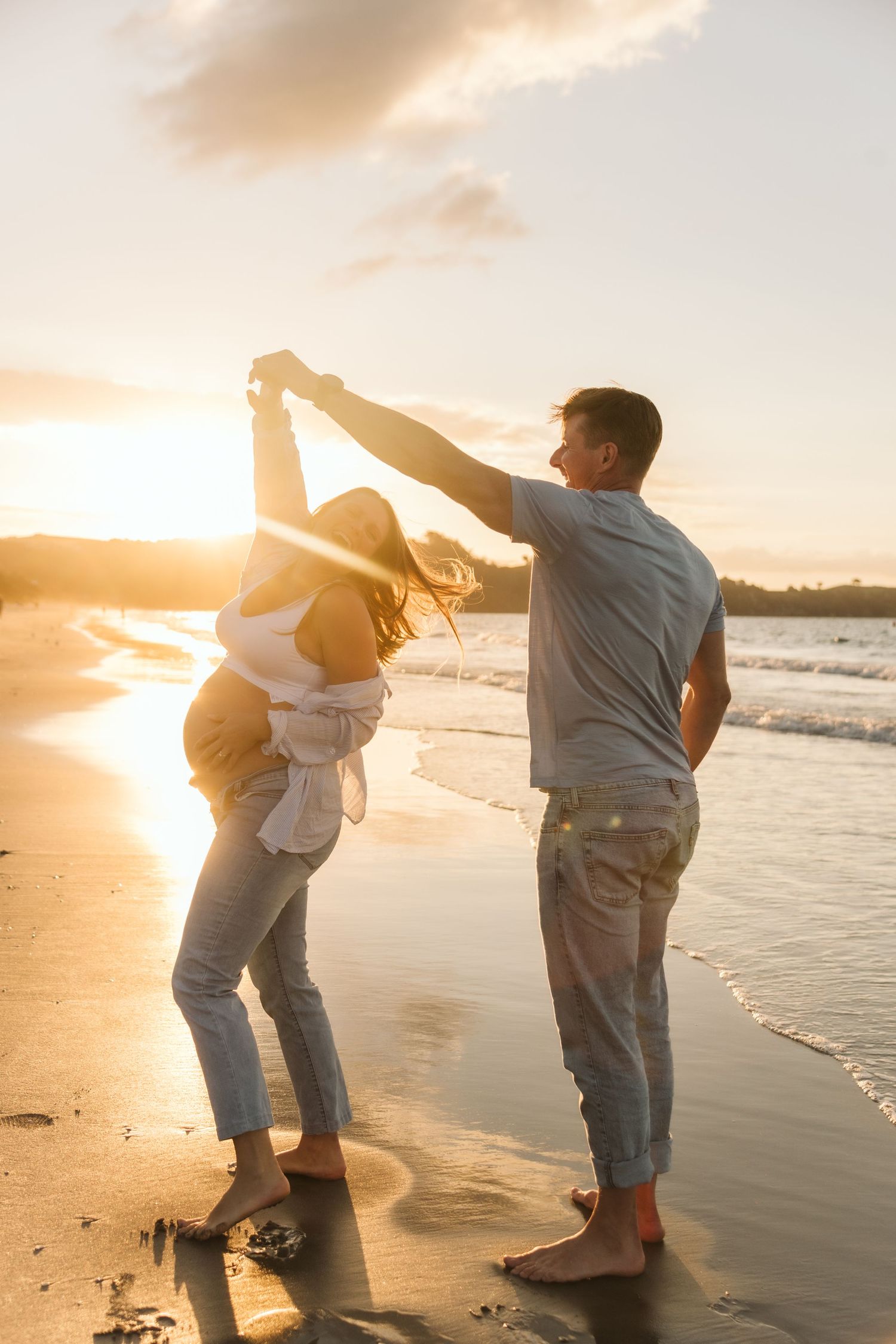 A collage of beach wedding photos showing newlyweds walking along sandy shores with turquoise ocean views.