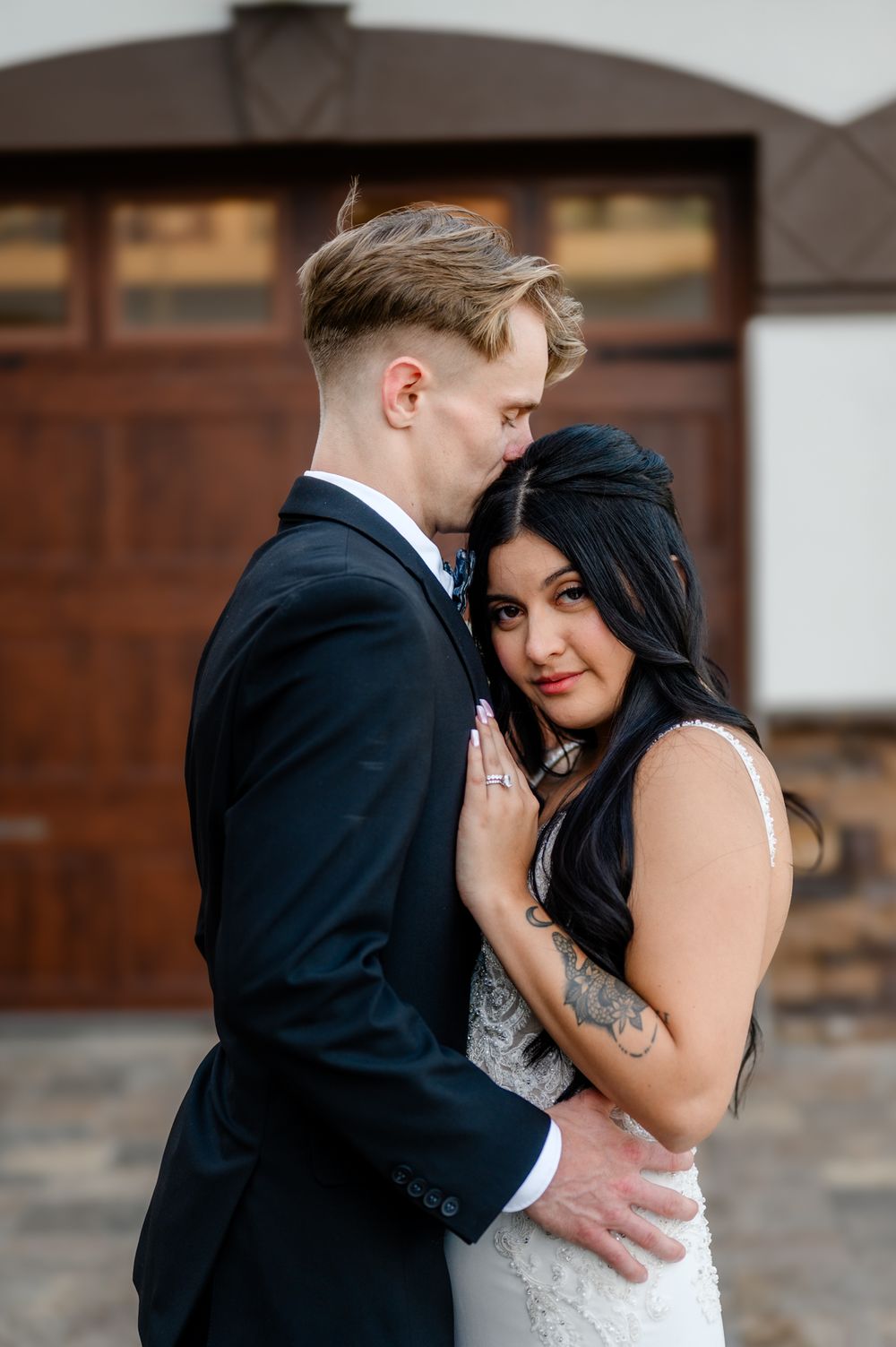 A romantic wedding portrait series showing tender moments between newlyweds in formal attire.