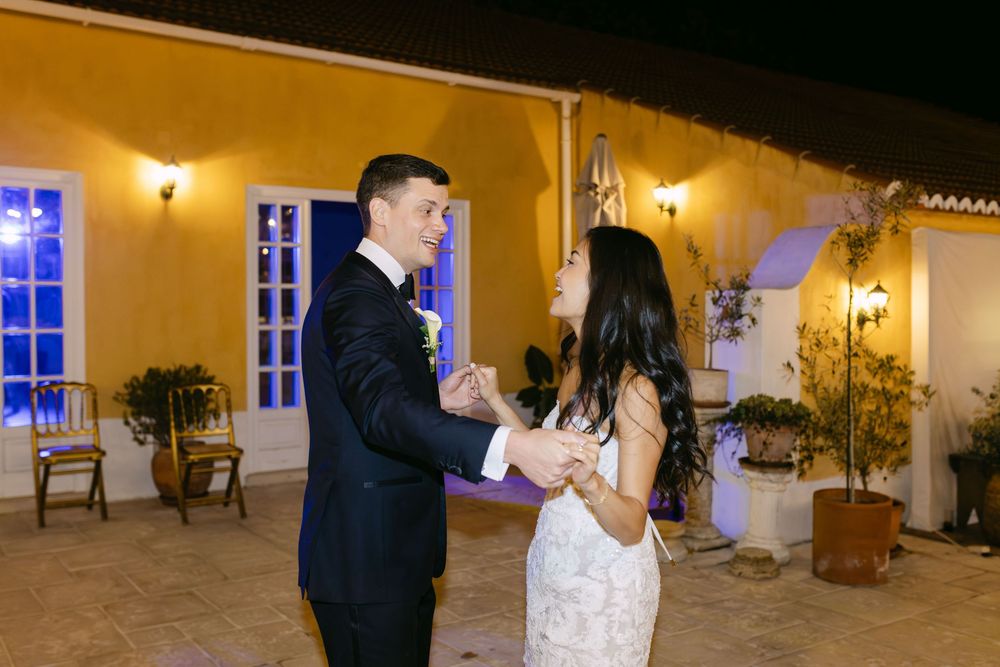 Bride and groom dancing together outdoors at night at Quinta Nova do Hespanhol Lisbon wedding