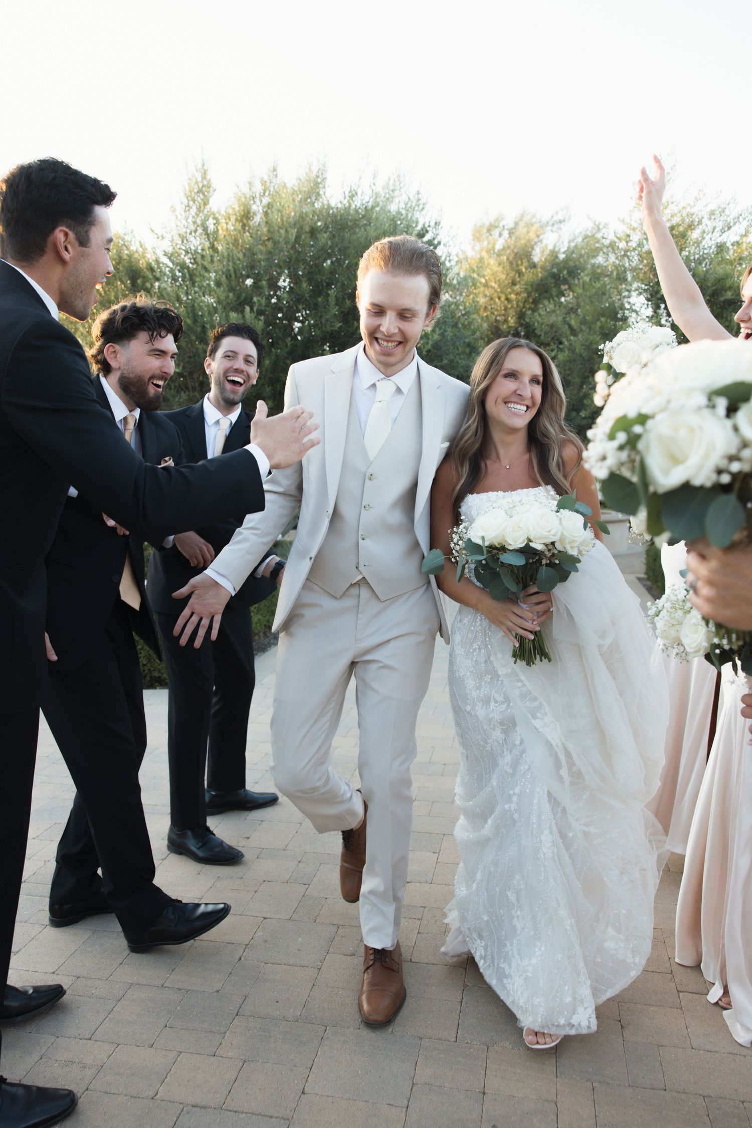 Bride and groom with their wedding party at Tuscan Rose Ranch in Santa Paula, California