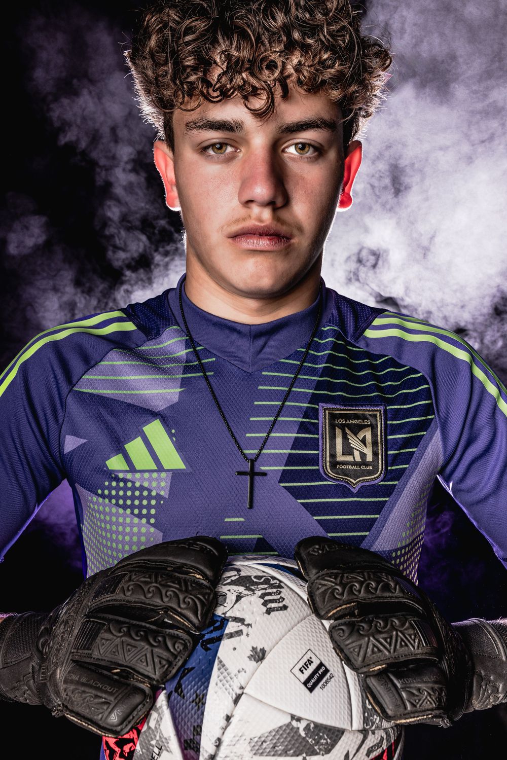Professional soccer player portraits with dramatic smoke effects and LAFC team branding in navy and neon colors.