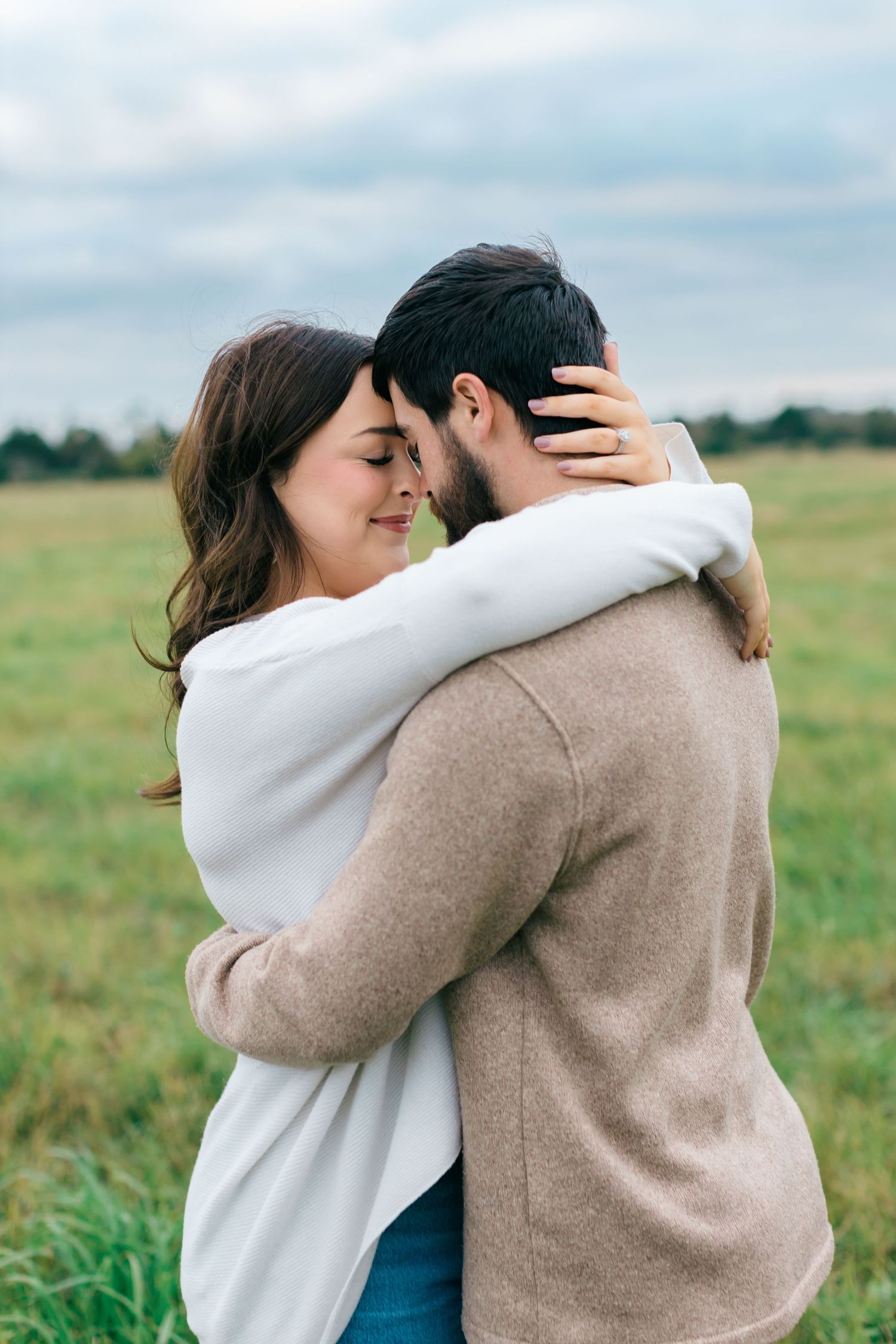 Sweet hug from couple in field in Orange TX