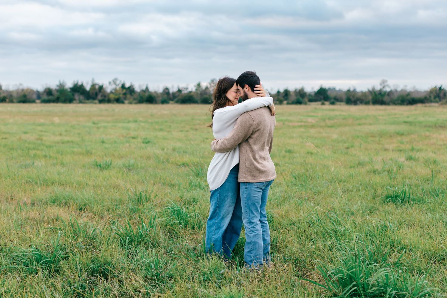 Couple portraits in field