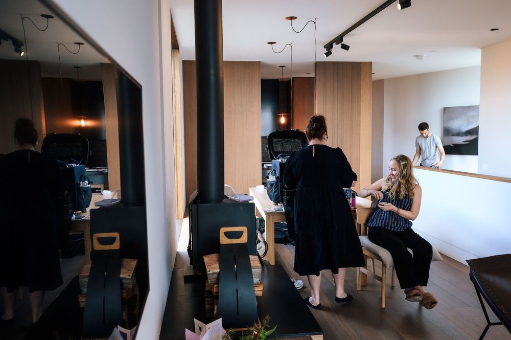 A behind-the-scenes view of a photo or video production setup in a modern space.