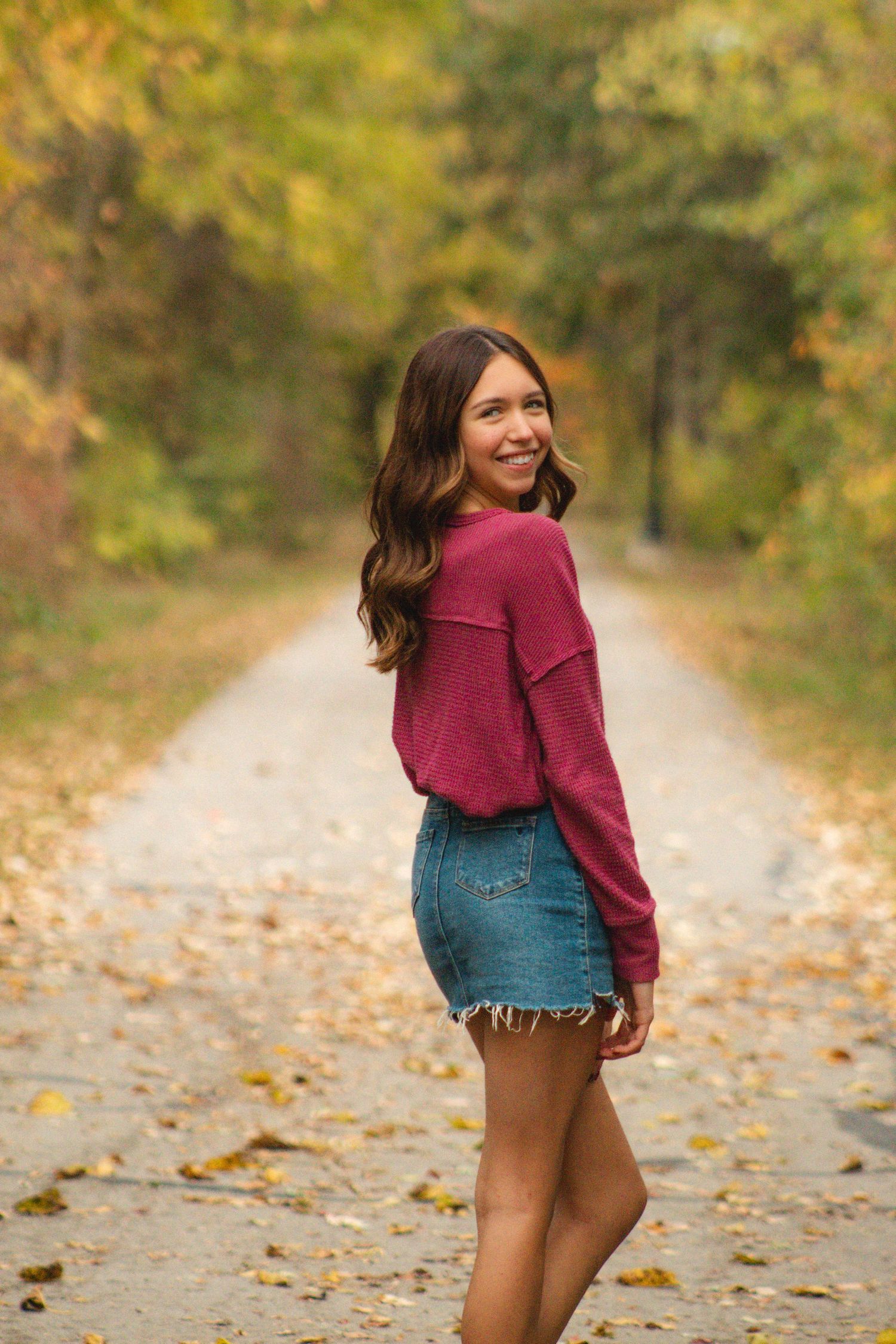 a girl posing in a walkway