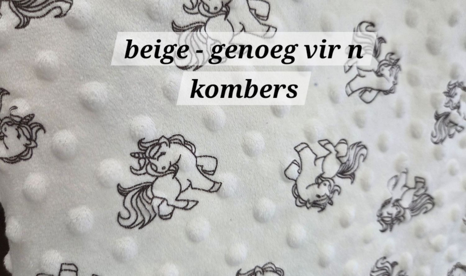 Beige minky dot fabric with unicorn print pattern, enough material for a baby blanket or kombers.