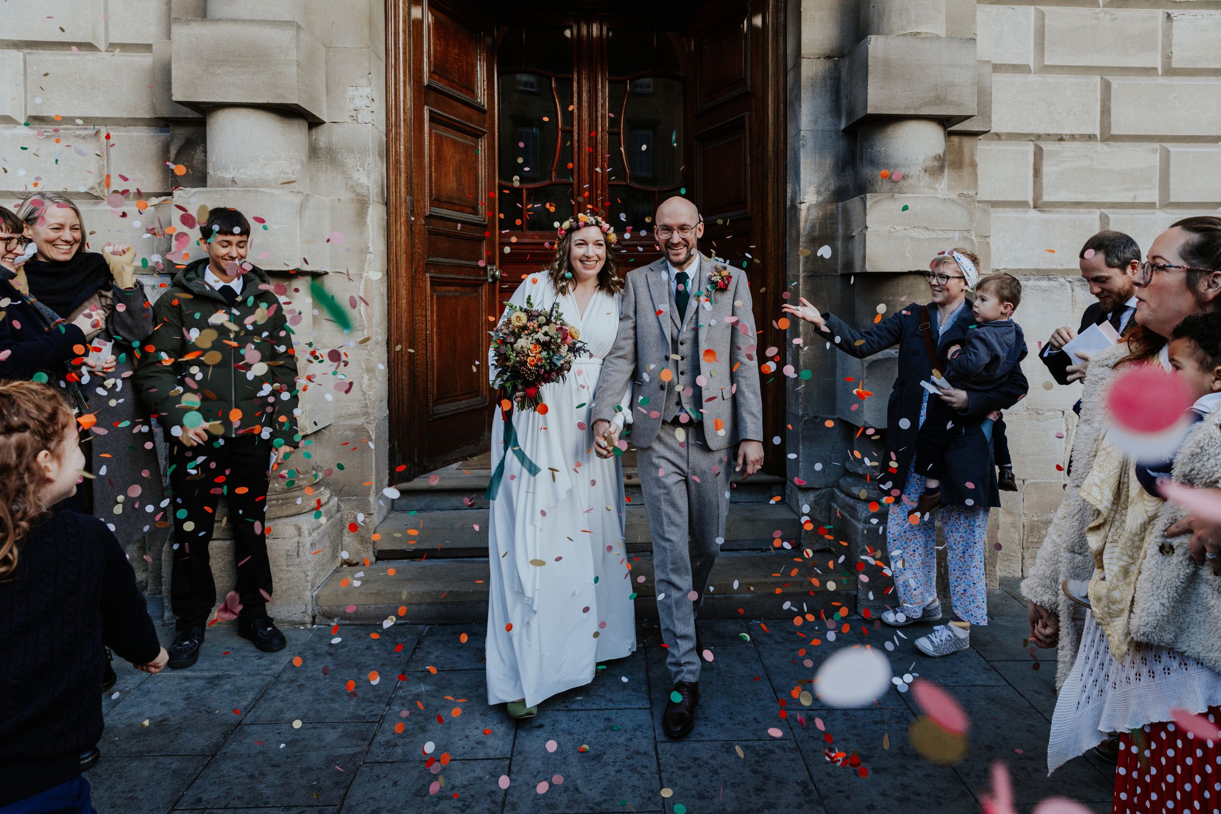 Bride and groom confetti photos at Guildhall in Bath