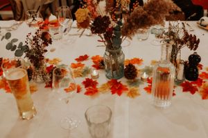 autumn wedding table decor , red yellow colours leaves instead of flowers