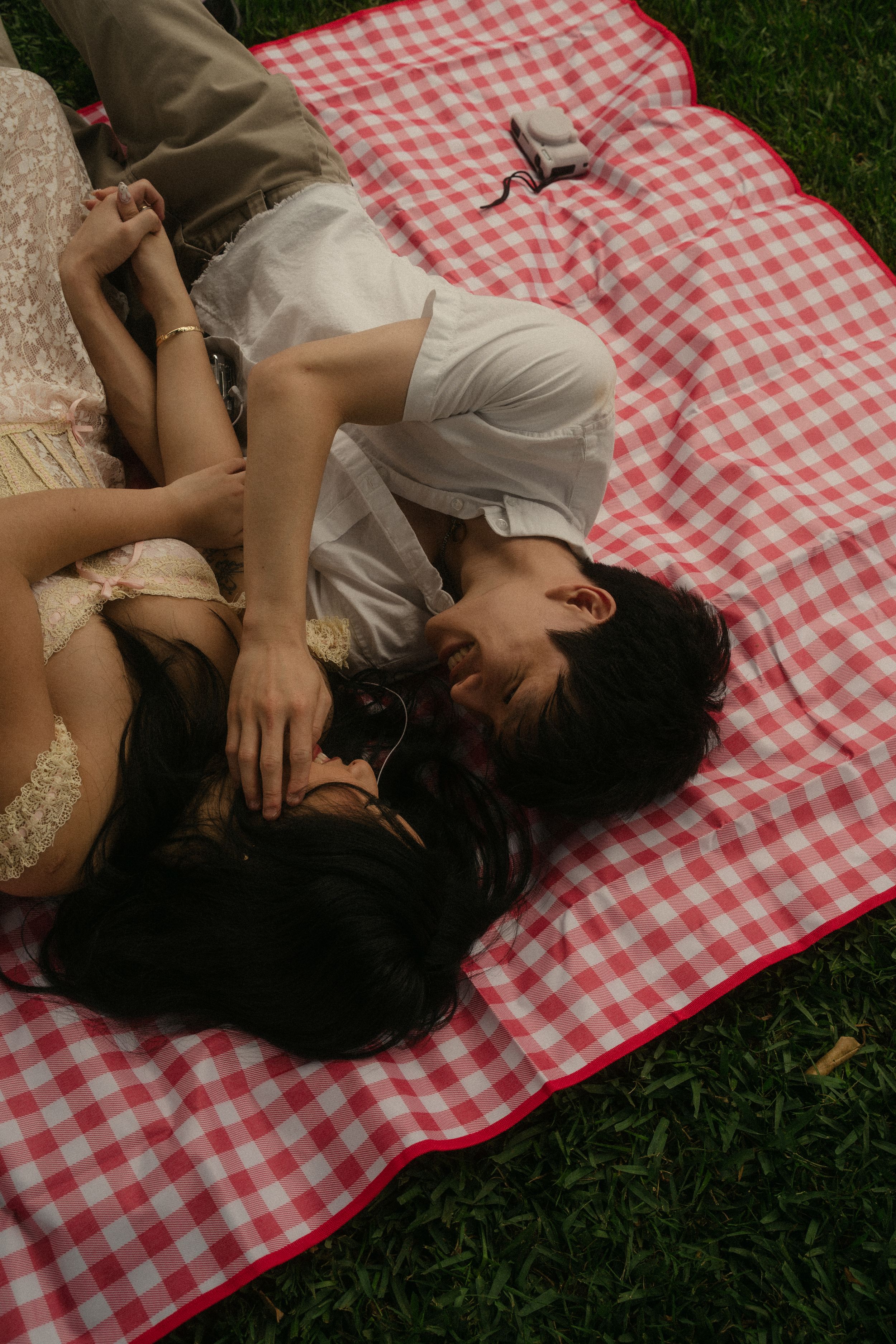 Romantic date photoshoot at Huntington Library gardens with personal tape player and camera props
