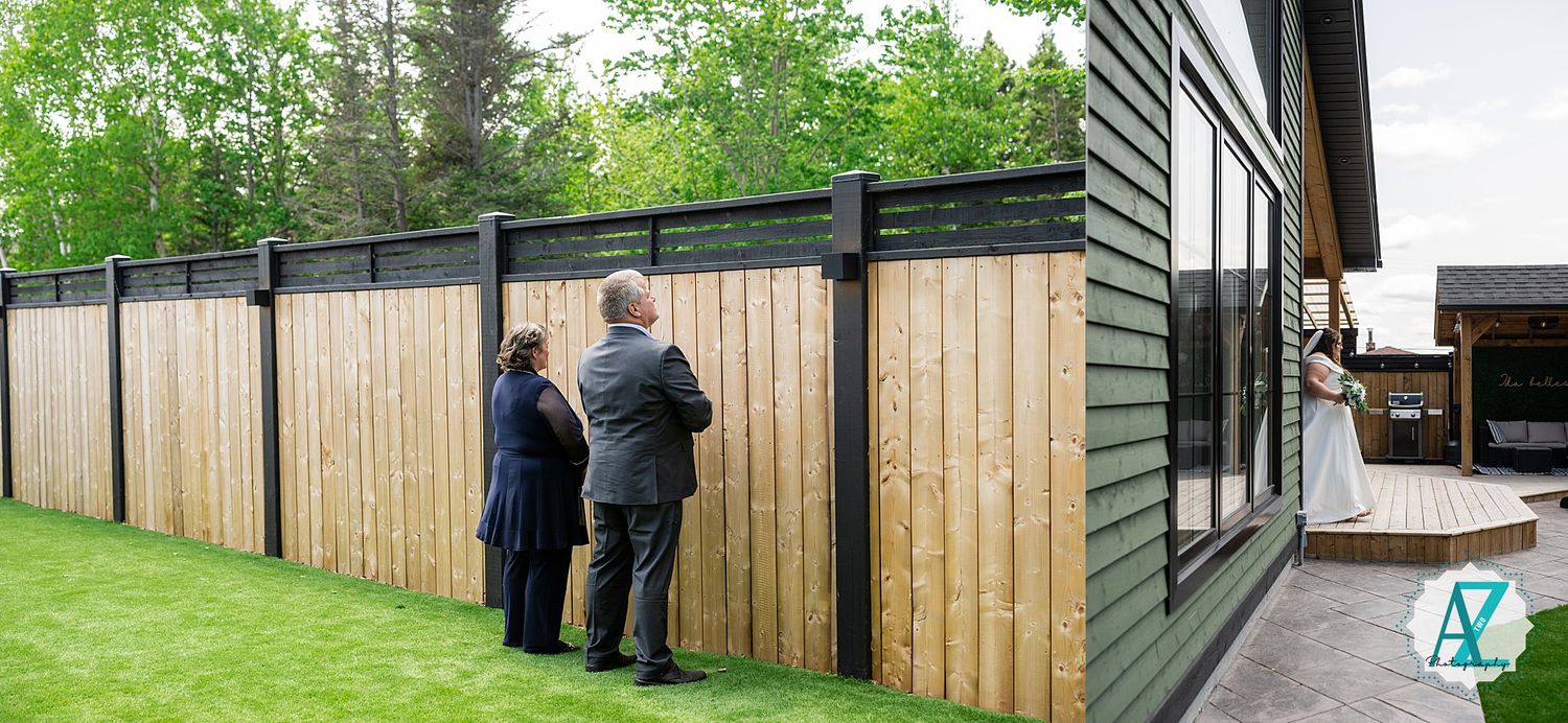 A wooden fence installation process shown in multiple stages from posts being set to final construction completion.