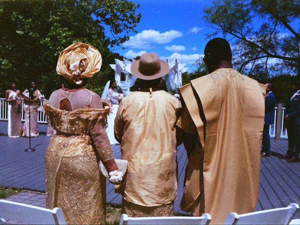 Film-style wedding photo of altar ceremony with family in foreground at Gettysburg wedding.