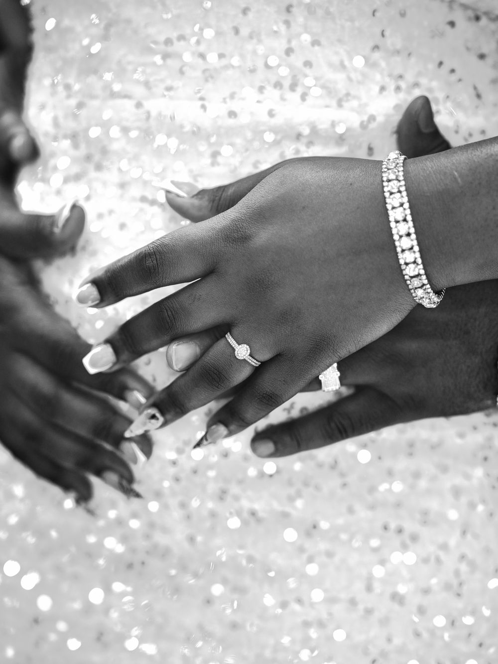 Black and white detail shot of wedding bands captured at Baltimore County Courthouse civil ceremony.