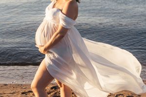 Pregnancy photoshoot in Shediac New Brunswick photography packages, romantic documentary storytelling maternity session at Parlee Beach