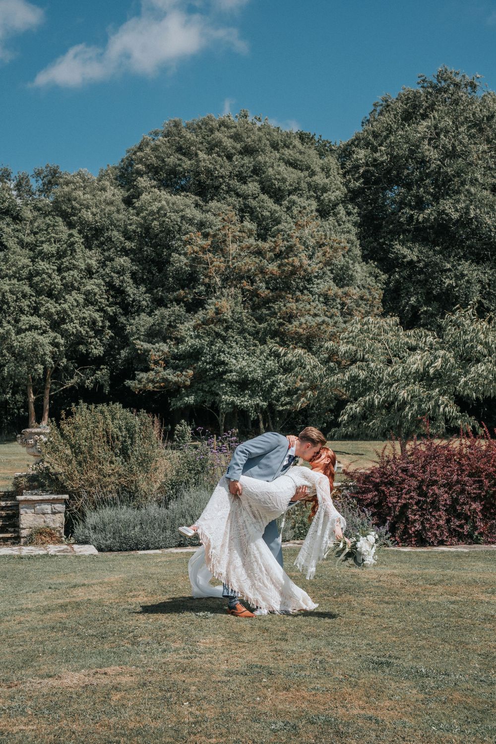 Bride and Groom portrait in gardens of Rockbeare Manor