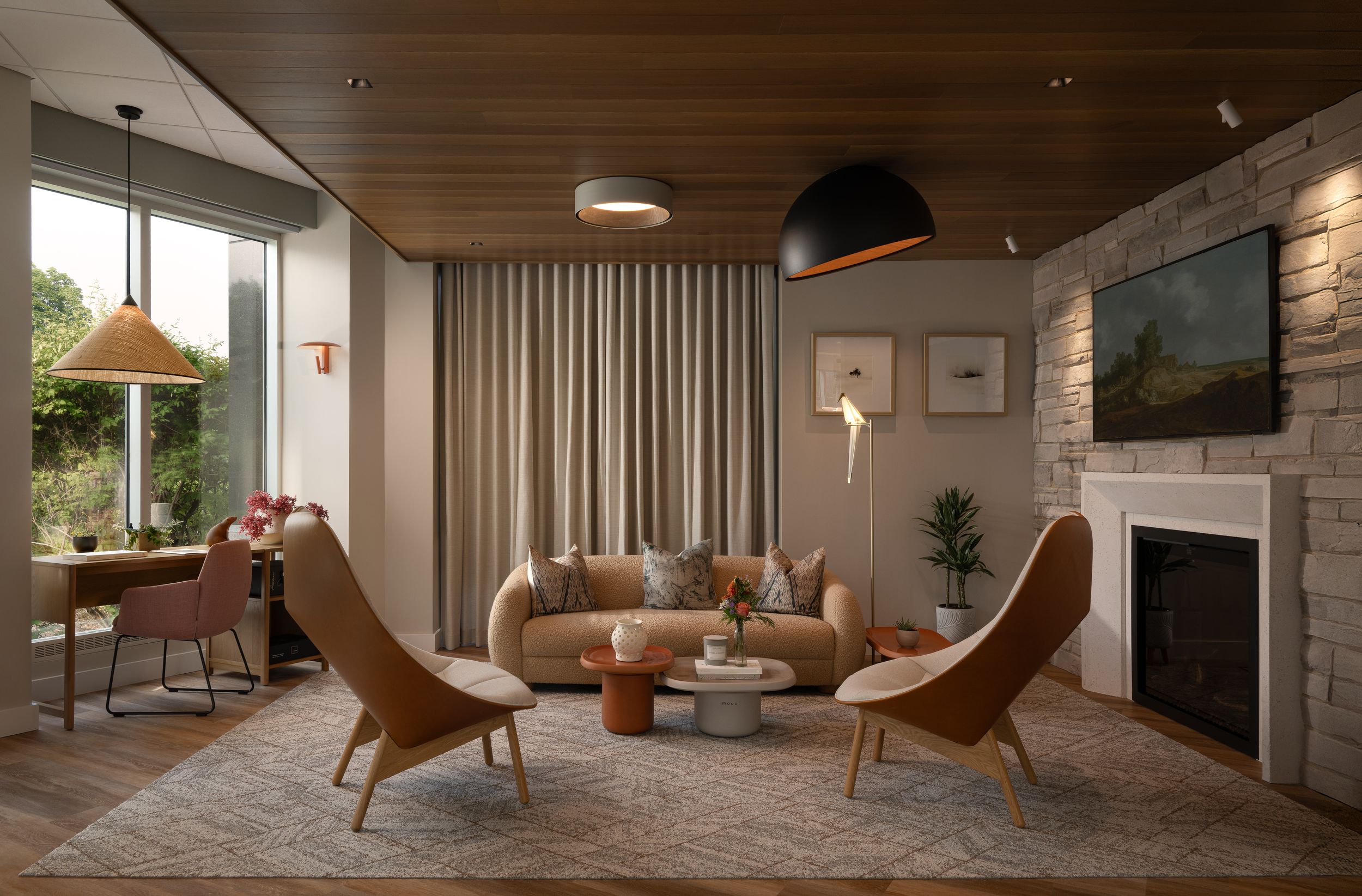 Modern minimalist living room interior with wooden walls, leather chairs, and natural light flowing through large windows.
