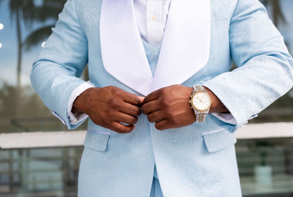 Editorial-style portrait of couple on yacht deck by luxury wedding photographers in Florida