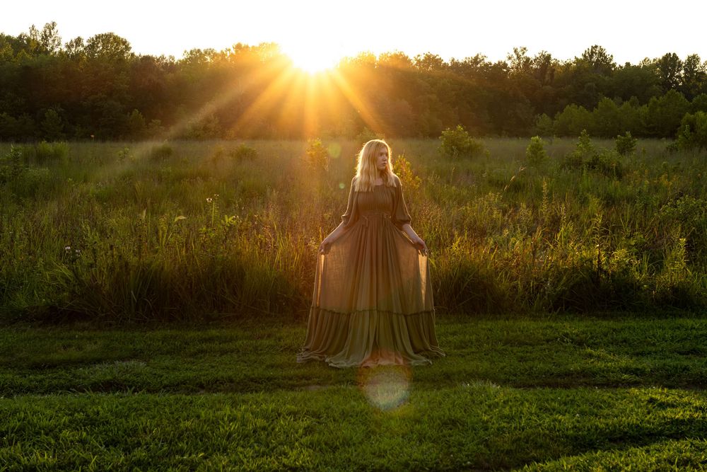 Outdoor portrait photography with rental flowy dress. Golden hour. Indian Camp Creek located outside of St. Louis, MO