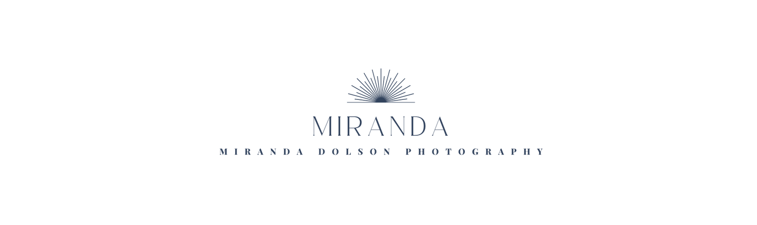 A logo design for "MIRANDA" in elegant black lettering with decorative typography against a light background.