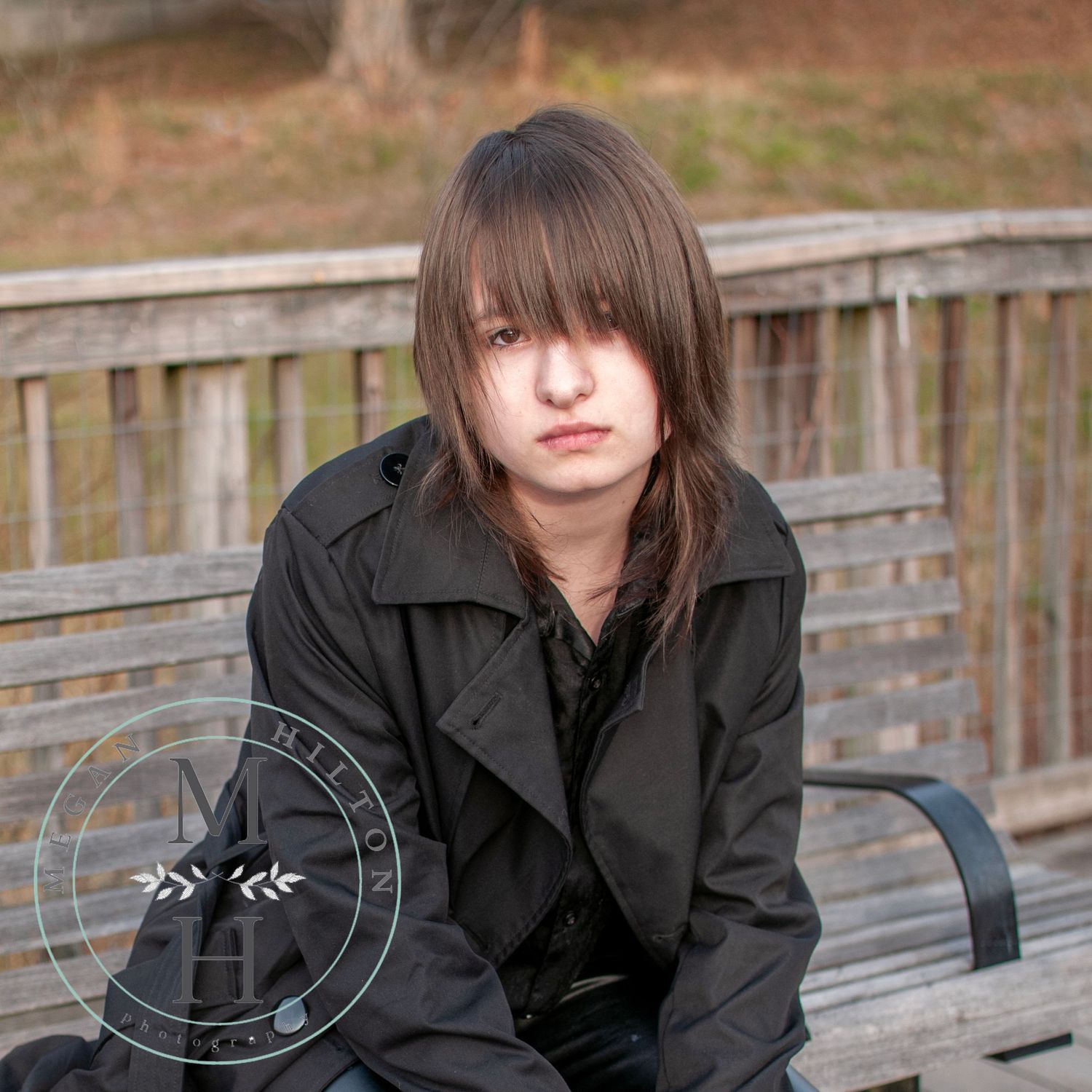 Senior photo sitting on bench pose