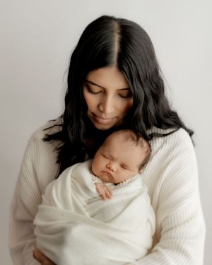 Mother and newborn sharing a quiet moment together