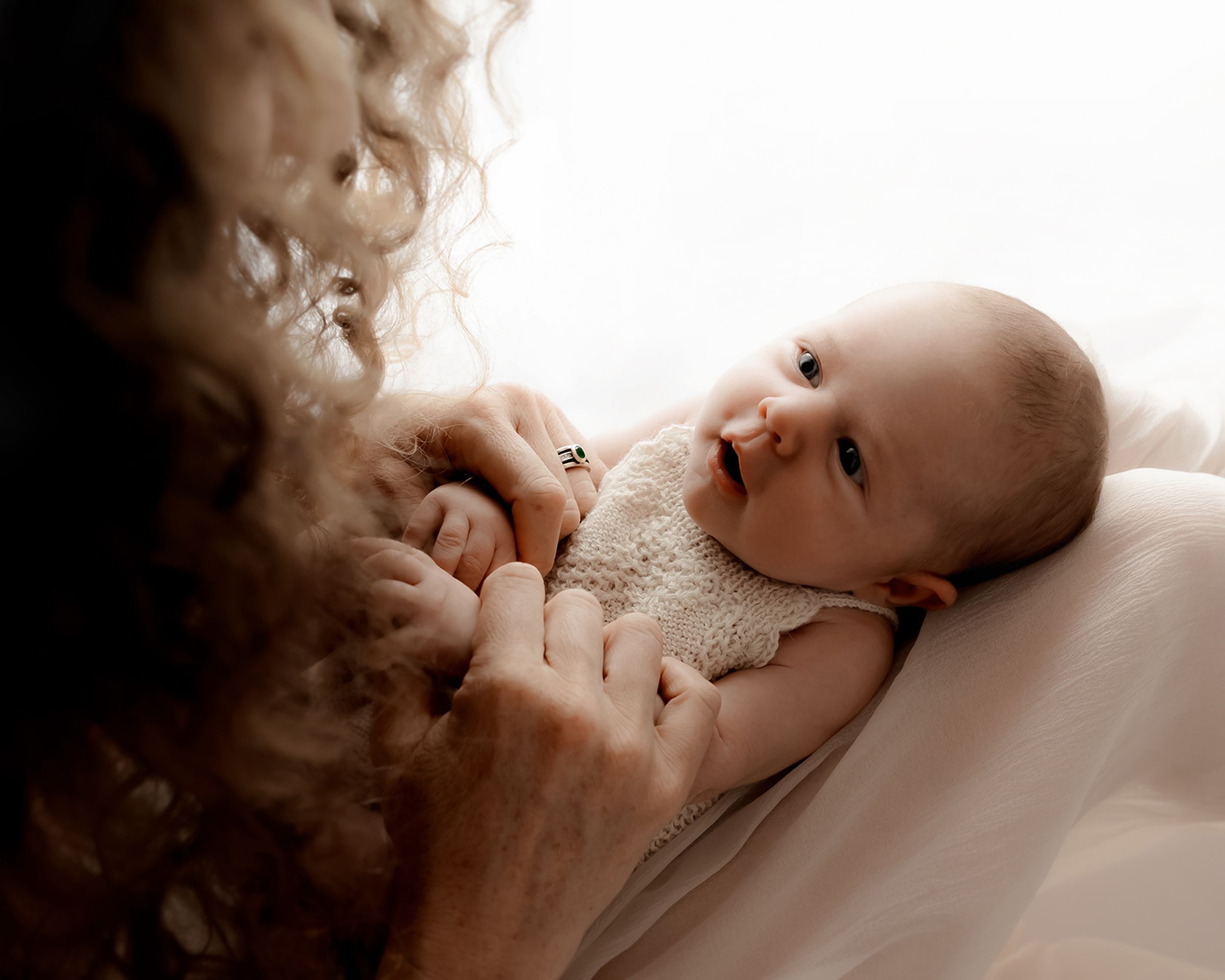 Delicate newborn details preserved through photography